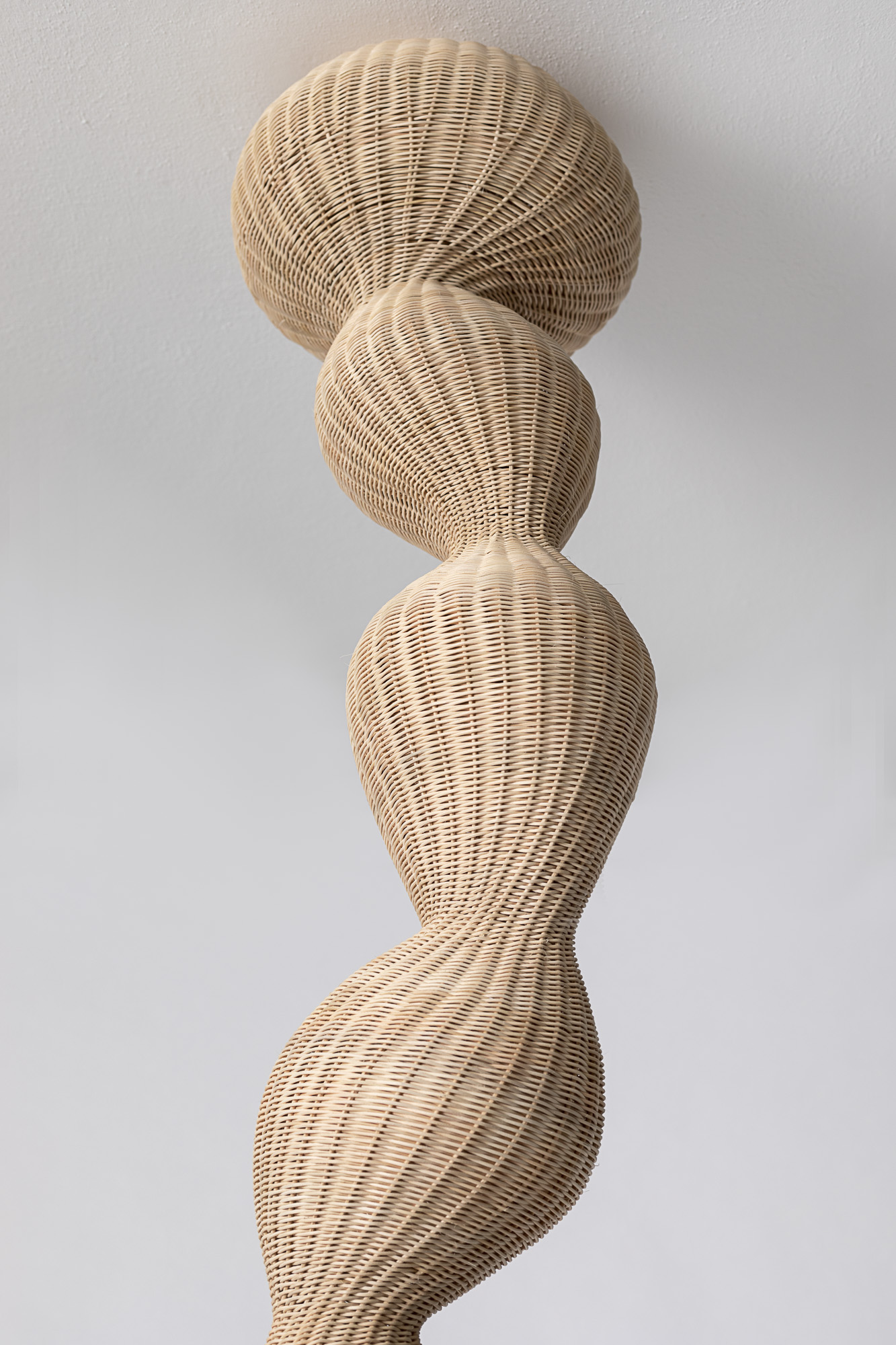 "As If The Sand Were Stone",
2021,
Wood, leather & woven rattan and found Israeli ceramic from the factory of Kfar Menachem,
 247x30 cm