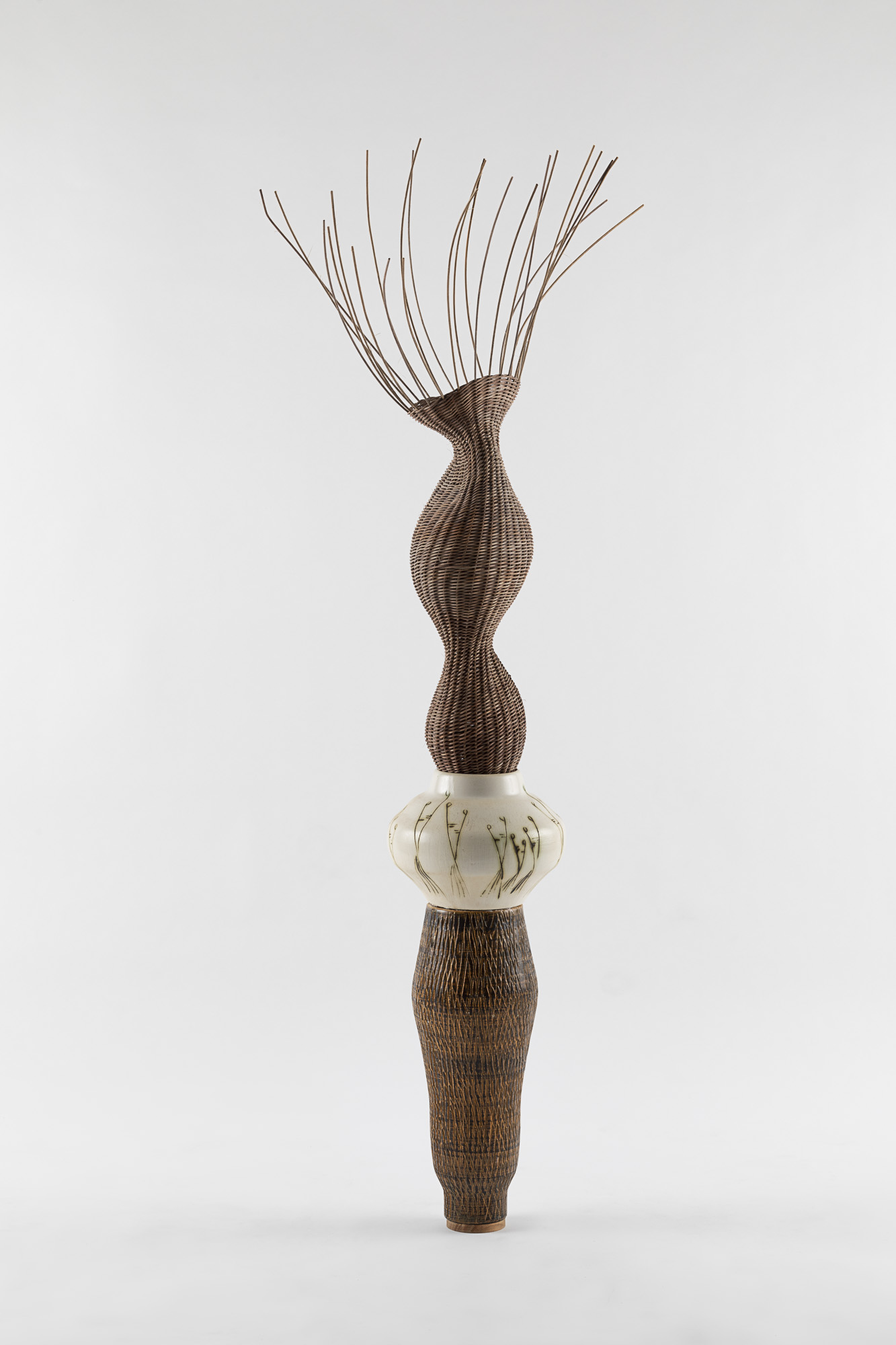 "Ritual Whisper",
2021,
Woven rattan and Israeli ceramics from the factories of Harsa & Kad Yad,
110x35x65 cm